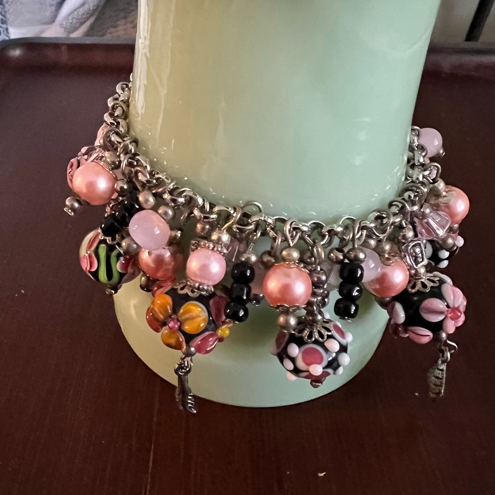 Vintage Charmed pink bracelet cha cha style. Silver tone, faux pearls,
Lamp work